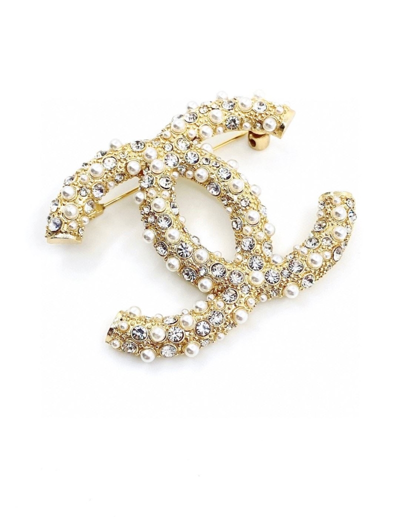 Ch**el brooches